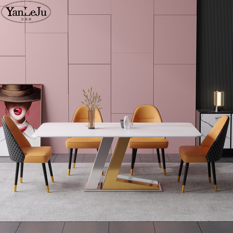Nordic light extravagant titanium alloy and gold and silver dining table and chairs combined household small family type rock plate dining table designer personality-like board room