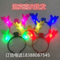 Christmas night market stalls glowing headband glowing antlers elk horns Christmas Eve glowing antlers concert atmosphere