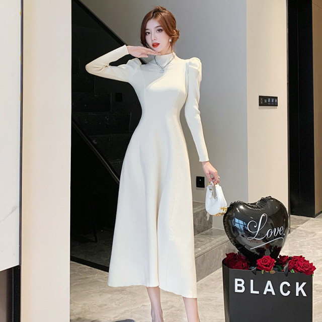 Autumn and winter new French style long section with coat knitted dress women's puff sleeve knee sweater long-sleeved skirt