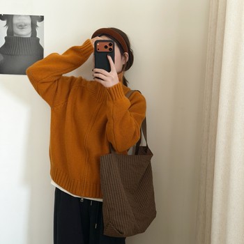 In addition, the small stand-up collar zipper knitted cardigan for women 2025 winter new versatile sweater jacket is warm and slimming.