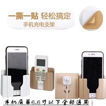 Put the mobile phone storage box on the wall of the bed and put the mobile phone on the wall.