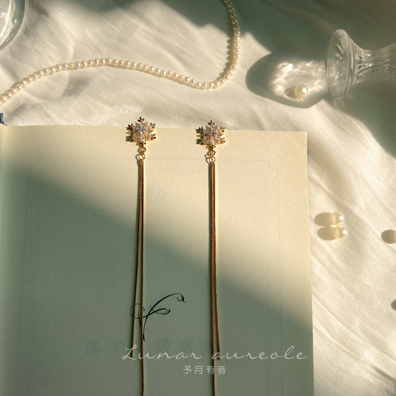 Yuyue has a sound fresh snowflake earrings s925 silver simple long version high-end earrings earrings new gift female
