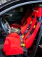 Red Recaro Sr7 Gk100 Car Seat Modified into a Racing Seat with Strong Side Support and Wrap-Around Design