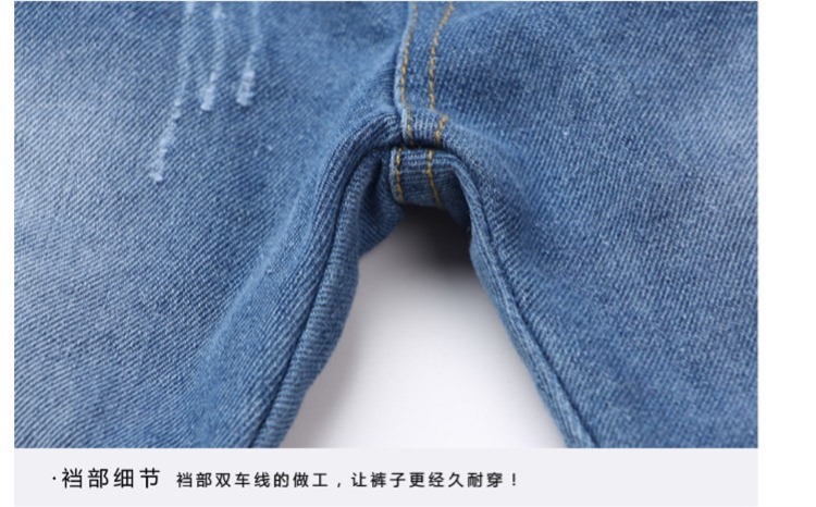 Mùa xuân và mùa thu mới cho trẻ em gái lớn quần denim trẻ em quần jean hoạt hình phiên bản lỏng lẻo quần bé trai quần jean bé gái