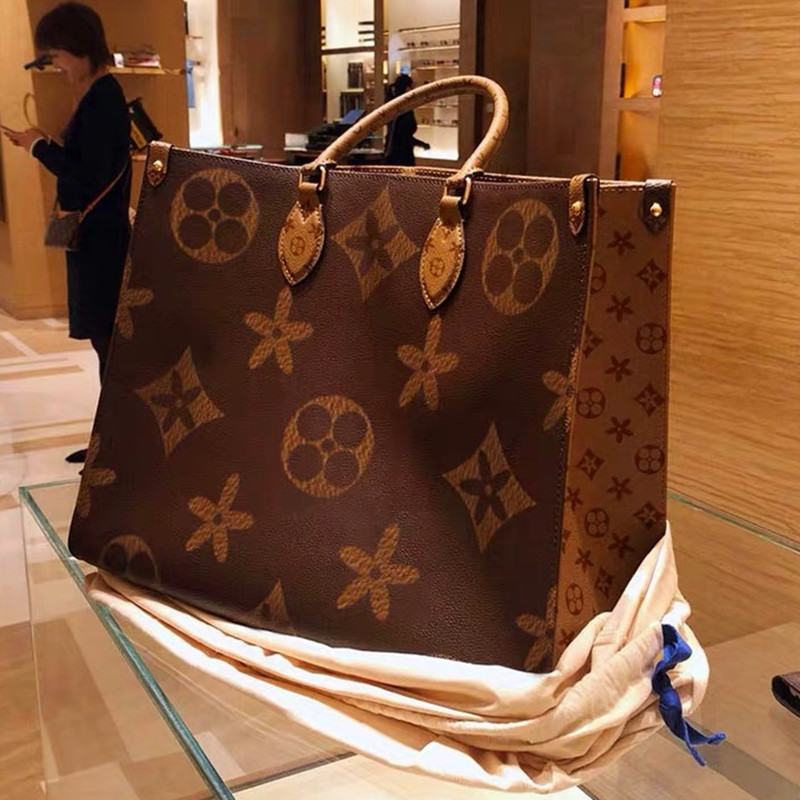 French DUDK women's bag new retro large capacity double face spelled out leather printed single shoulder bag tide