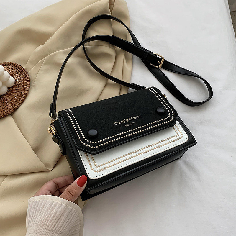 Singapore Women's Bag Light Extravagant Brand Fashion Collision Color Superior Sense Single Shoulder Thin with frosted diagonal satchel 100 hitch a little square bag tide