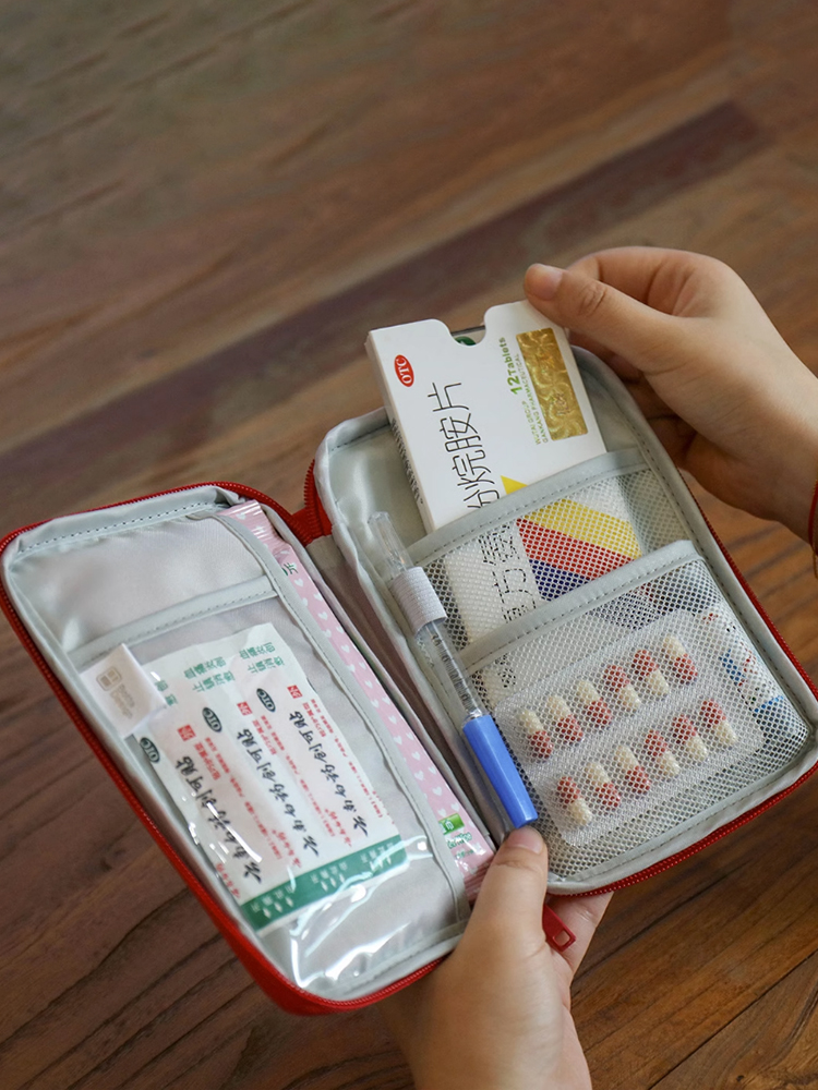 <!--旅行便携式医药包学生儿童药品袋户外旅游车载随身急救用品收纳包-->