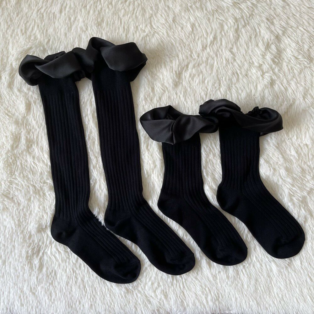 Hand-stitched three-dimensional rotating bubble mouth pleated lotus lace pure black women's stockings INS personality catwalk calf socks solid color