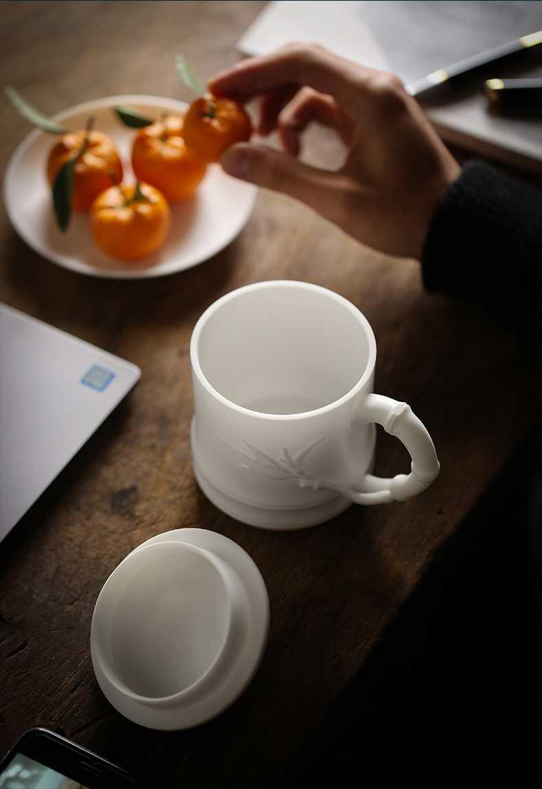 Dehua white porcelain filtering tea cup tea, black tea tieguanyin tea water separation ceramic office cup men and women