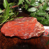 Guilin chicken blood jade natural jade mouth material black background bright red material black background red wool raw stone 0 655 kg