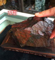 Guilin Longsheng natural jade Guilin chicken blood jade hand toy pieces black and red ornaments and carving materials chicken blood stone