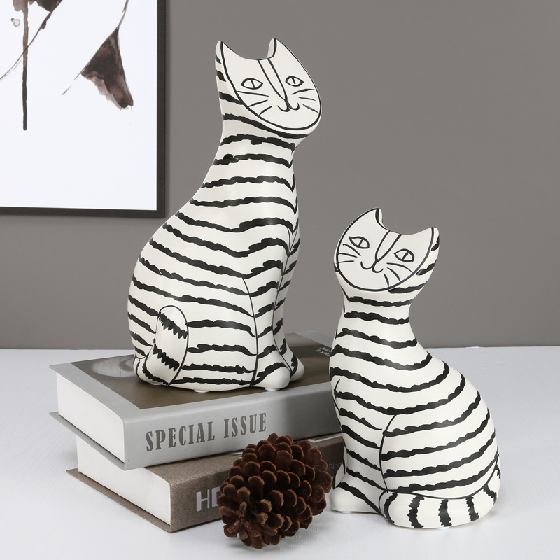 I and contracted ceramic flat face cat sitting room porch place black and white stripe household adornment the example room floor