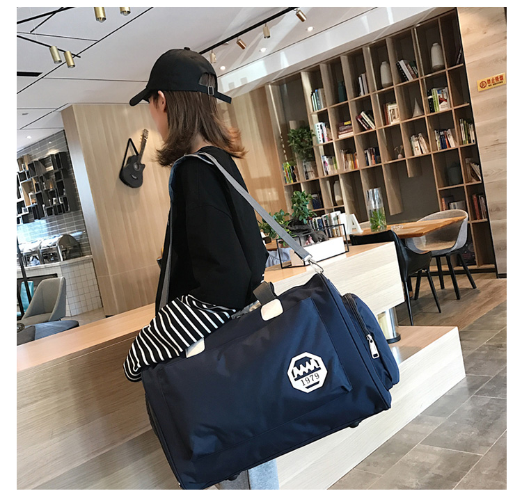 Túi du lịch Phiên bản Hàn Quốc của thủy triều ngắn bền vải Oxford nam và nữ mới Messenger Messenger túi xách tay du lịch dung lượng lớn ba lô du lịch loại lớn