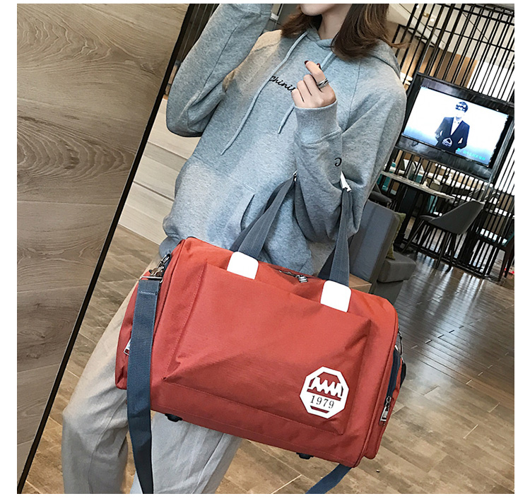 Túi du lịch Phiên bản Hàn Quốc của thủy triều ngắn bền vải Oxford nam và nữ mới Messenger Messenger túi xách tay du lịch dung lượng lớn ba lô du lịch loại lớn