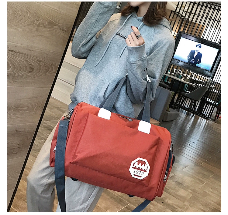 Túi du lịch Phiên bản Hàn Quốc của thủy triều ngắn bền vải Oxford nam và nữ mới Messenger Messenger túi xách tay du lịch dung lượng lớn
