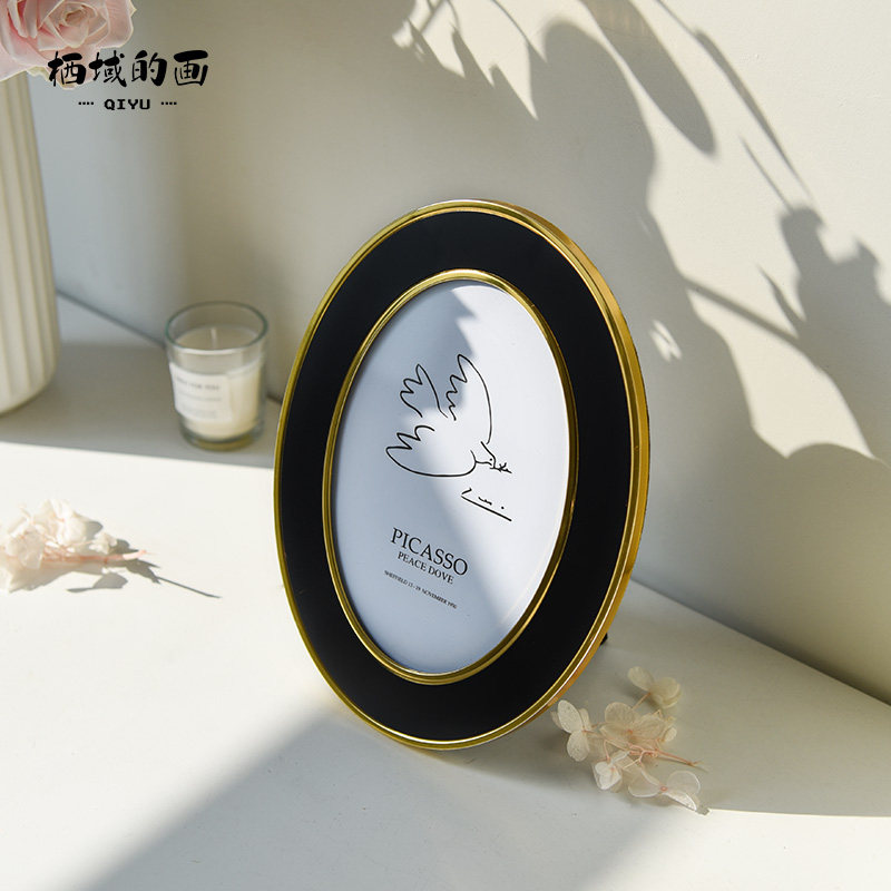 At the beginning of time oval photo frame table light luxury modern minimalist creative 6 inch 7 inch metal black photo frame