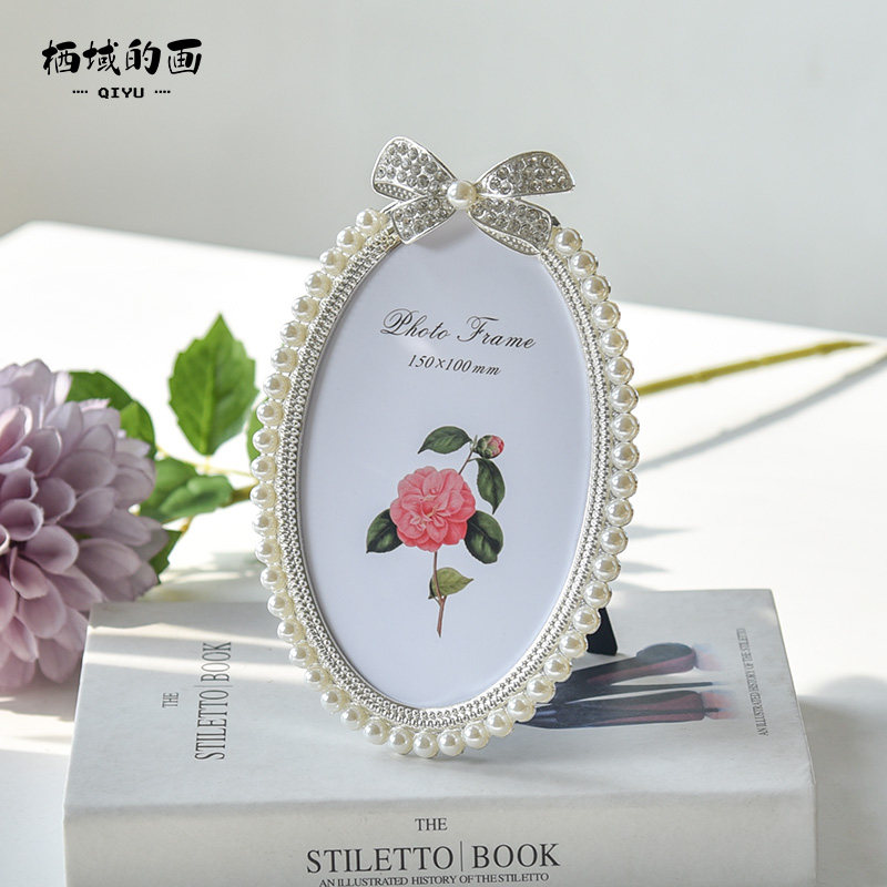 Time few first oval small photo frame Pendulum Table Eurostyle White Wedding Photos Metal 3 Inch 6 Inch 7 Pearls Butterfly Knot