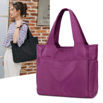 New solid color large capacity multi-pocket simple lightweight waterproof Oxford nylon shoulder bag portable travel bag female tide
