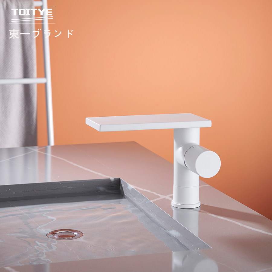 Japan's Dongyi white creative all-copper waterfall basin faucet heightened table basin hot and cold powder room faucet