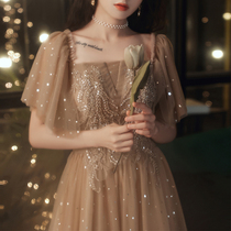 Champagne gold evening dress female 2021 new high-end banquet fairy socialite host dress skirt advanced texture