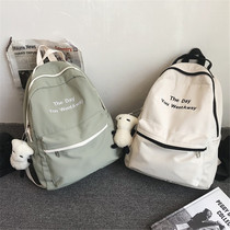 Han version of childrens supplementary school bag boys junior high school elementary school students boys and girls light double shoulder bag 2020 new tourist backpack