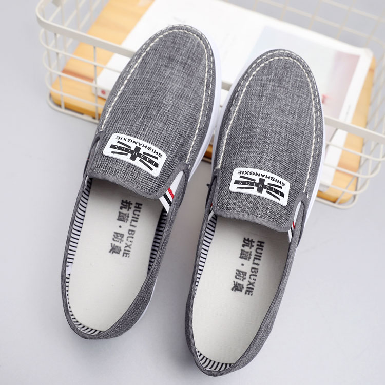 Giày nam mùa xuân Giày vải Bắc Kinh cũ Giày lười Giày thông thường Phiên bản Hàn Quốc của thủy triều giày anta