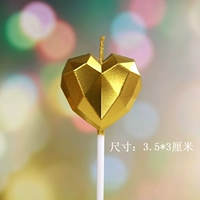 Свеча в форме золотого алмаза