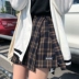 Mùa thu và mùa đông Phụ nữ Hàn Quốc thiết kế sang trọng retro kẻ sọc Váy len cao eo mỏng Một chữ hakama váy ngắn Váy
