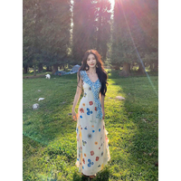 Beautiful seaside resort style printed sleeveless dress for women summer French style waist slimming floral long dress