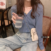 Original yumiko Korean wind chic art feel ~ Seoul temperament young girl gentle cream blue and lazy v collar knit cardigan