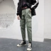 Quần yếm nam thương hiệu ulzzang lỏng lẻo hip hop quần nam phiên bản Hàn Quốc của xu hướng quần âu hoang dã quần lửng nam Quần làm việc