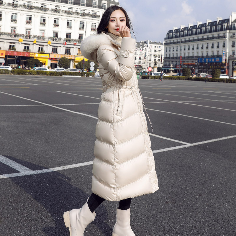 Down clothes woman medium long version white duck suede 2021 Winter new Euro goods thickened with cap over knee large fur collar jacket tide