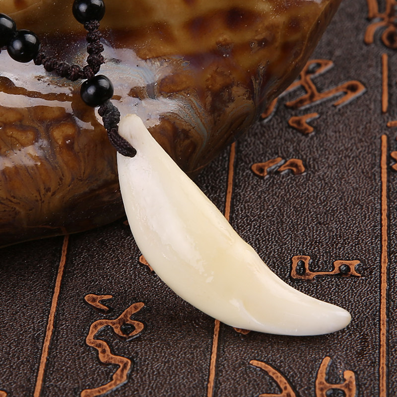 dog tooth pendant
