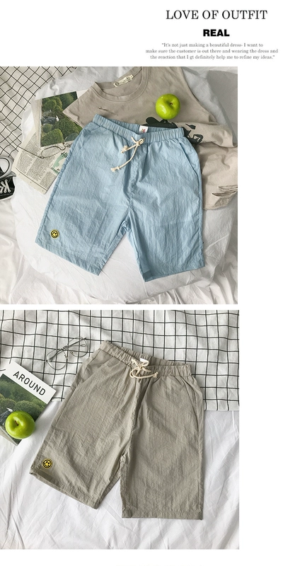 Quần short mùa hè nam phiên bản Hàn Quốc của quần sọc rộng bãi biển thanh niên phần mỏng quần lớn xu hướng năm quần