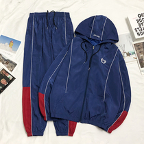 Leisure sports suit womens spring and autumn Korean version of loose bf Harajuku style hip hop handsome fashion students two-piece set