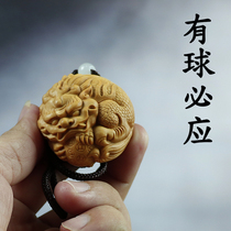 Yellow Yang wood carving animal leopard has the ball must hand the mans hand to carve the property handicraft transfer ball