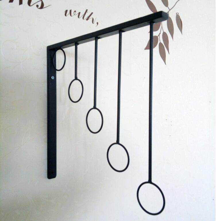 Clothing store Iron clothing rack Clothing display rack on the wall rack Clothing rack Clothes rack is hanging