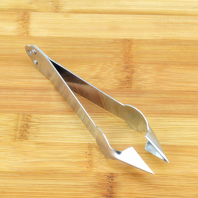 Stainless steel pineapples go to the eye to go to the seed clip Practical Feng Pear nail cutter Dig Seed Clips Pineapples to nail the nail