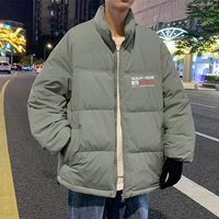 Зеленый пуховик