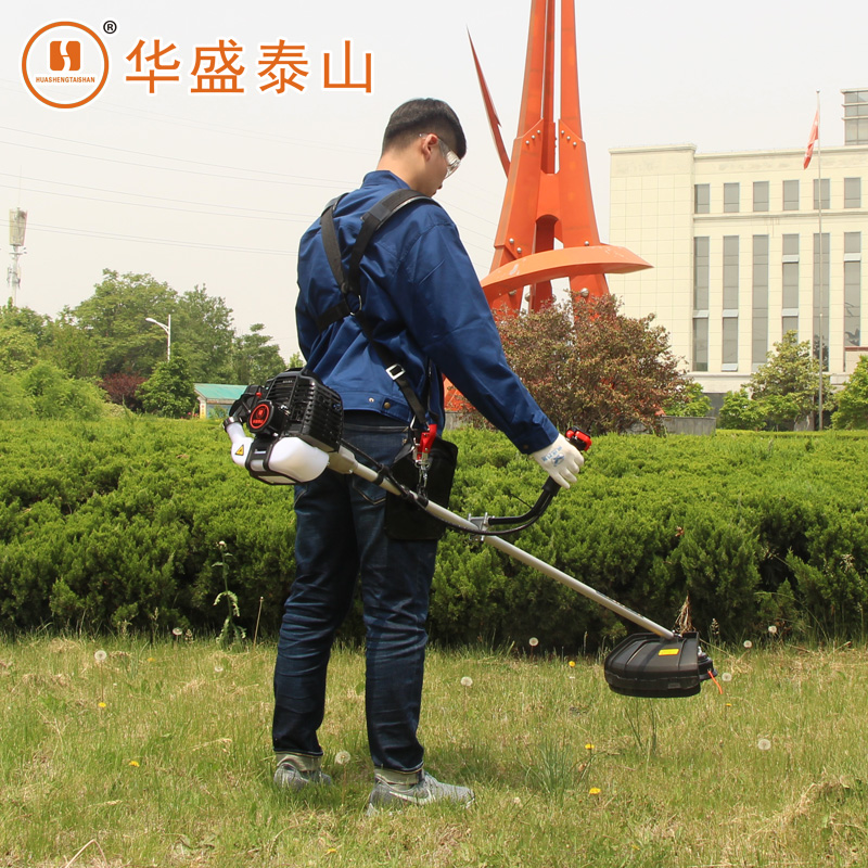 Shandong Huasheng lawn mower side-mounted 430 brush cutter two stroke gasoline small multi-functional orchard lawn mower
