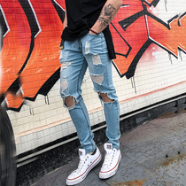 Muscle slim European and American fitness jeans mens super elastic hole sports pants loose simple Joker pants men and women
