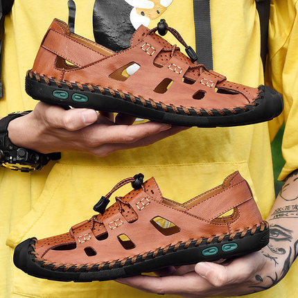 2022 New Baotou sandals men's summer hollowed-out genuine leather men driving non-slip soft bottom dongle beach shoe tide