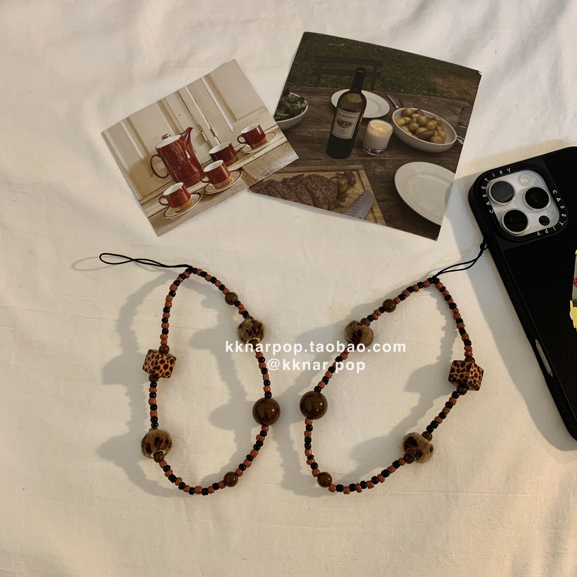 Stylish and fashionable brown leopard print phone strap for women, designed to prevent loss and keep cameras securely in place.