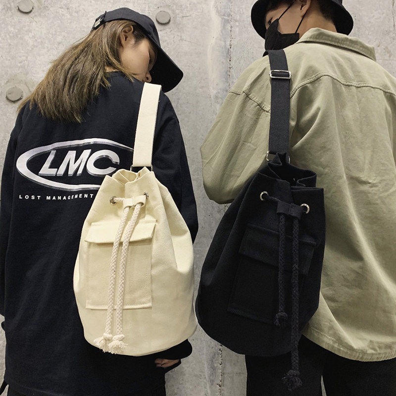 Canvas Slanted Satchel for men Students Han prints Tide Cards Hip Hop Day Ensemble Casual Minima Cylinder Small Single Shoulder Bag Woman