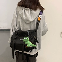 Черный маленький динозавр, подвеска