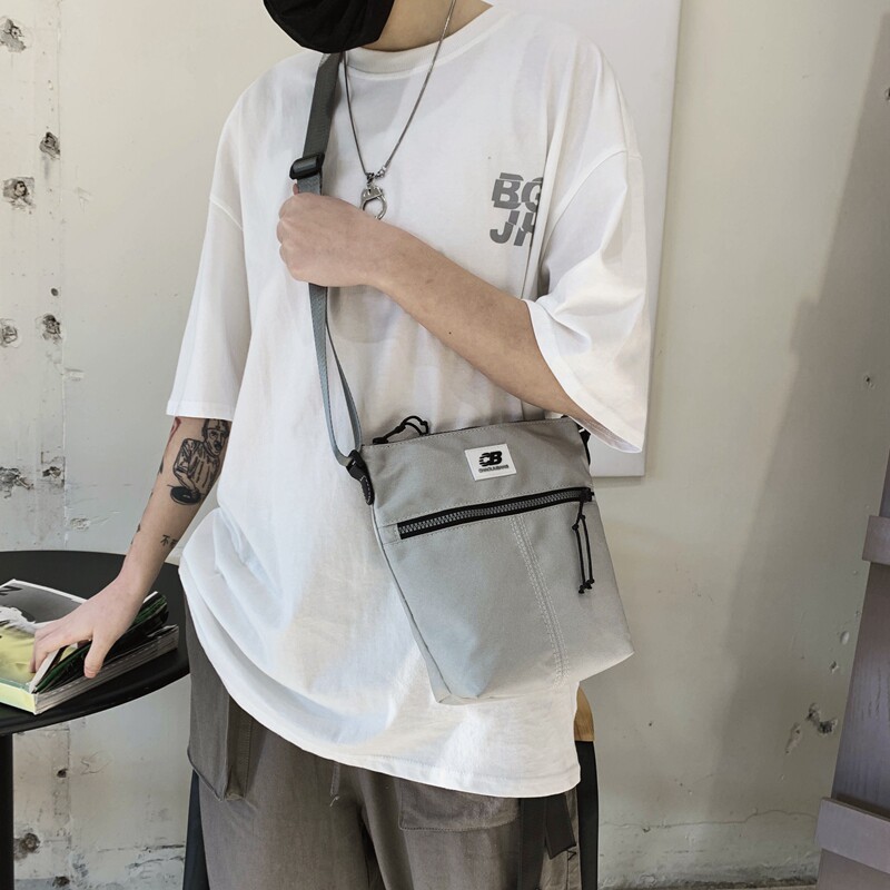 Messenger bag male ins trendy small bag canvas casual Japanese sports mobile phone backpack mini student shoulder bag female