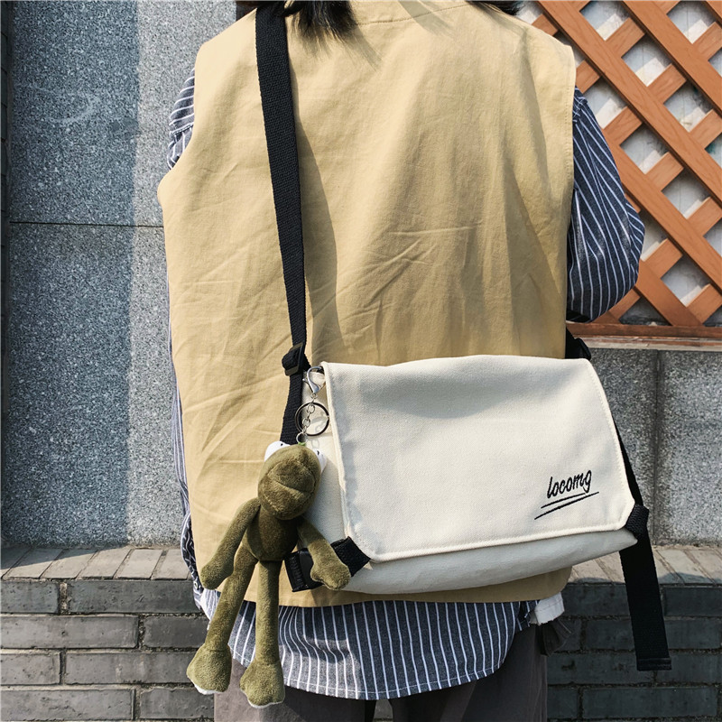 Canvas Slanted Satchel for men Students Korean version Trend women's fashion Tide Cards Hip Hop Japan Casual 100 lap single shoulder bag