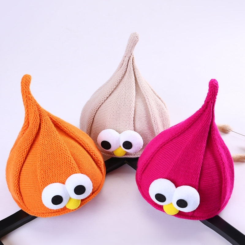 Korean version of the boy and girl autumn and winter warm knitted baby children pointy hat wizard big eyes cute cute hat