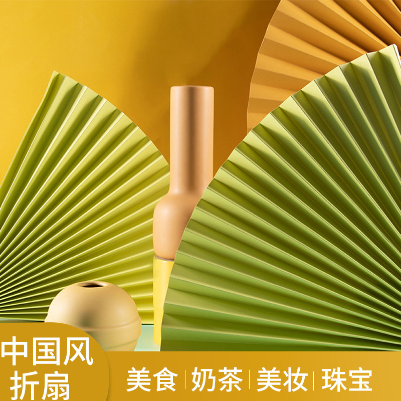 Photo ins Chinese style retro red folding fan new year background Mo milk tea cosmetics jewelry photography posing shot Randy solid color cardboard fan shooting small props decoration still life product food