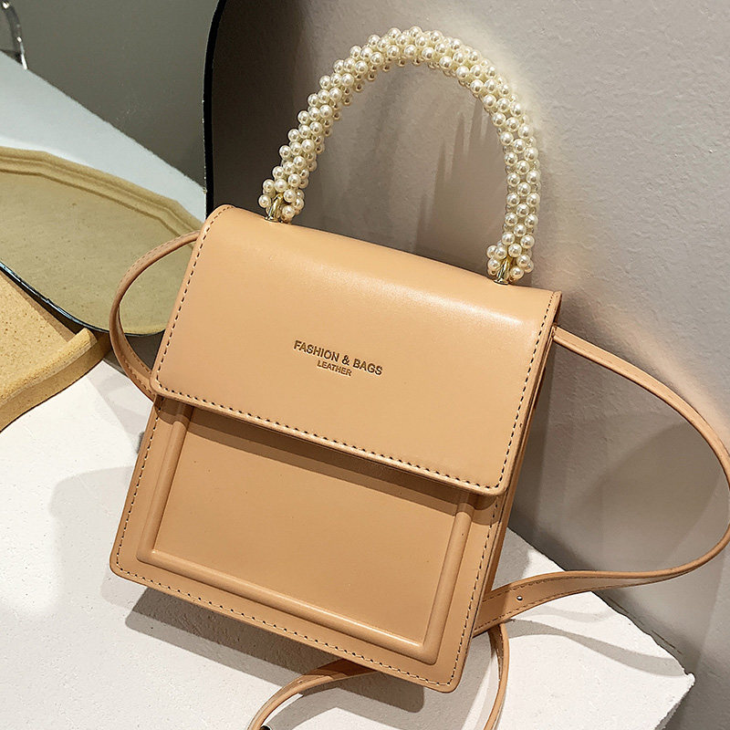 Pure Color Package Women's Package 2022 Spring Summer New Japan-South Korea Brief Casual Slant Scapegoat Fashion Foreign Pie single shoulder small square bag